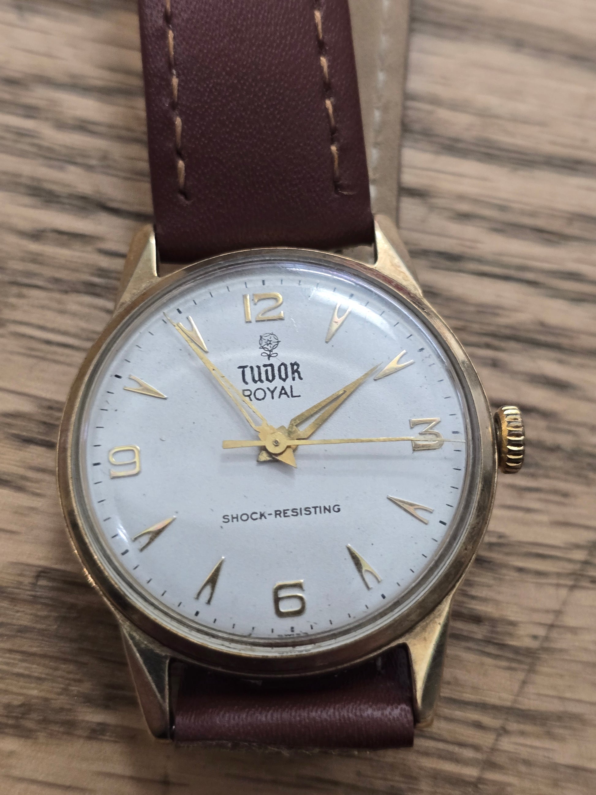 9ct yellow gold Tudor Royal watch with a brown leather strap, showcasing a classic and elegant timepiece.