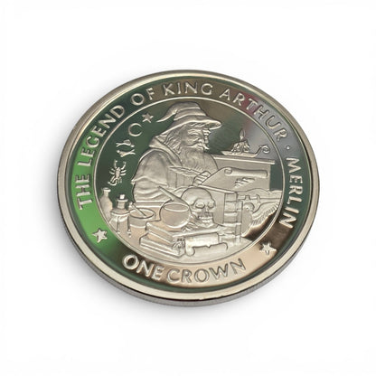 Silver King Arthur coin featuring a crown design, issued by Reeves and Sons, with detailed engravings on the coin's surface.