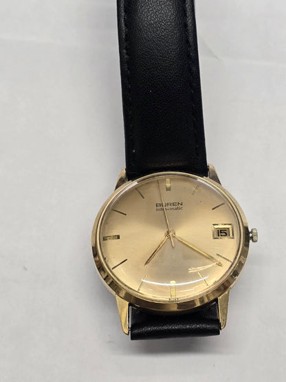 Reeves and Sons Vintage Buren Intra-Matic automatic men's watch with gold plating, sunburst dial, and date display.