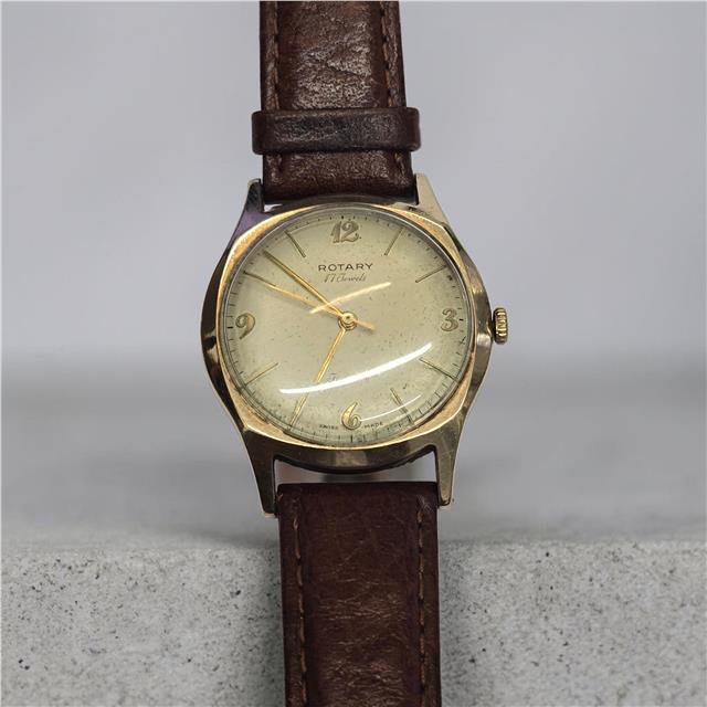 Yellow gold Rotary watch with a classic round face and elegant design, showcasing the 9ct gold finish and detailed dial.