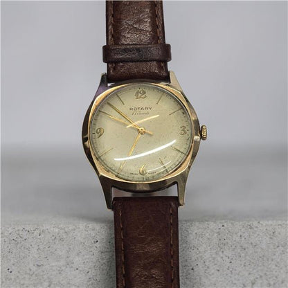 Yellow gold Rotary watch with a classic round face and elegant design, showcasing the 9ct gold finish and detailed dial.
