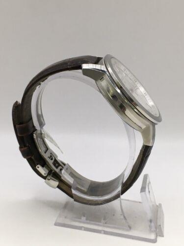 Elegant Tissot men's watch with a sleek design, silver dial, and stainless steel bracelet, showcasing classic Tissot watches.
