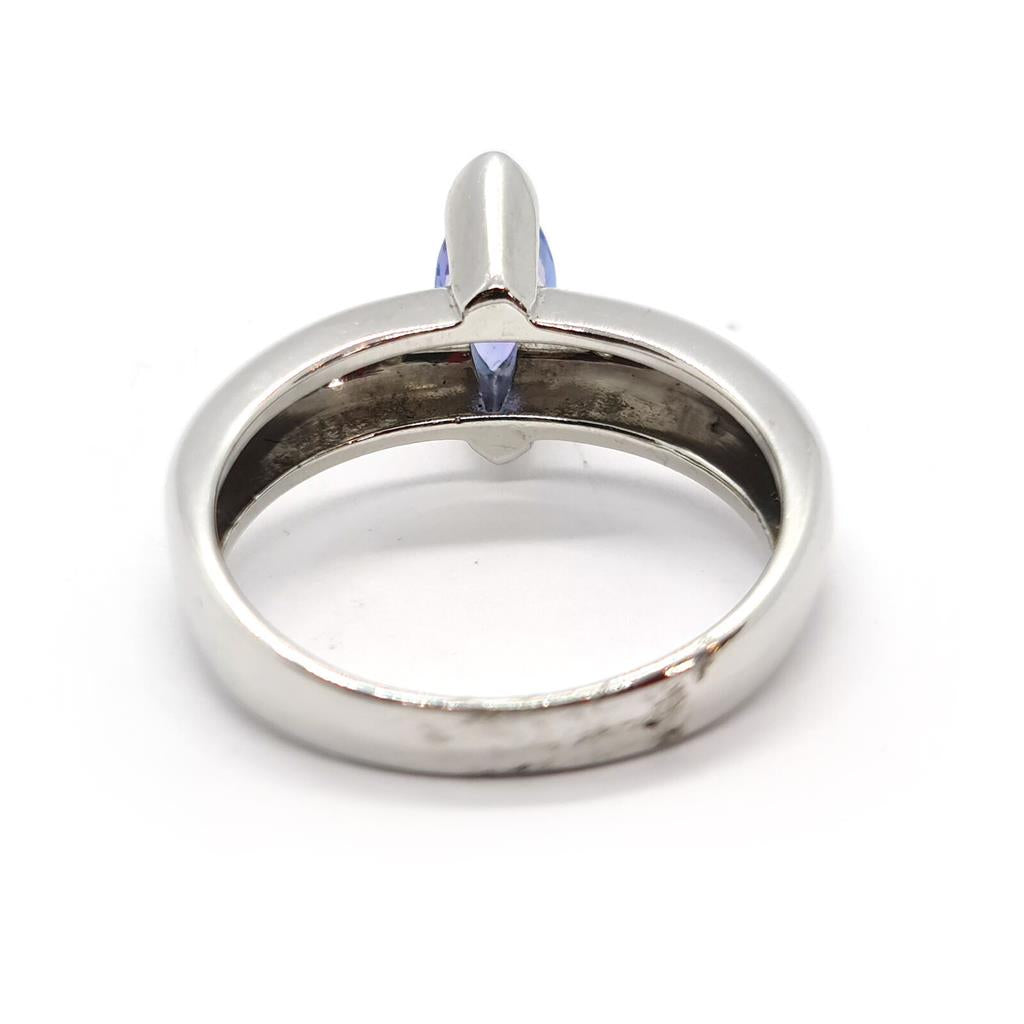 14ct tanzanite and diamond ring featuring a 0.85 carat tanzanite gemstone, set in a stylish unbranded ring design.