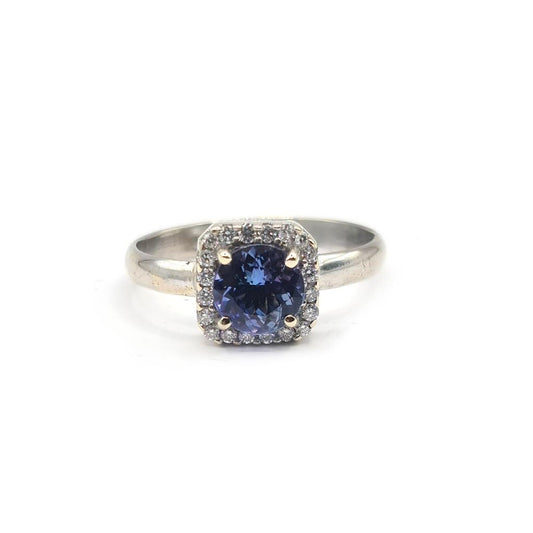 14-carat diamond halo style ring with 1.10 carats of sparkling diamonds, featuring a classic elegant design.