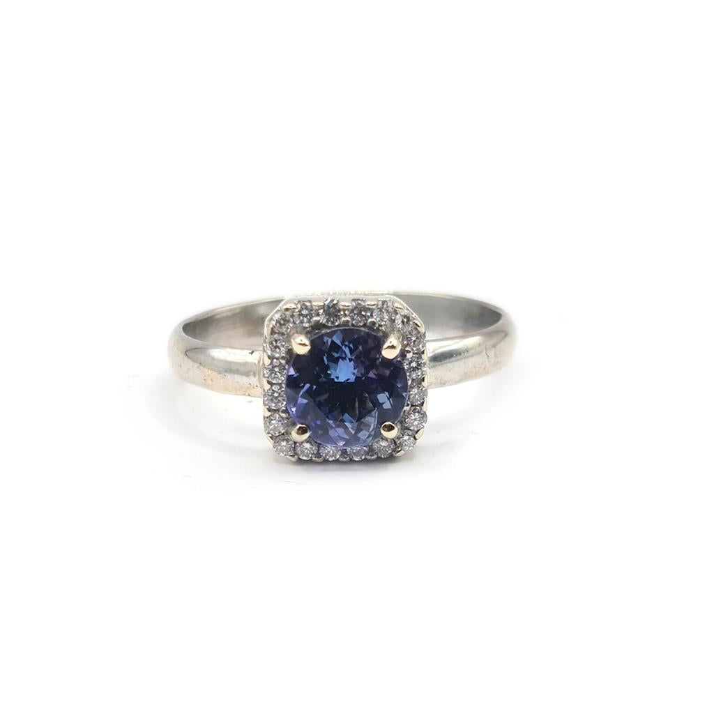14-carat diamond halo style ring featuring 1.10 carats of sparkling diamonds on a sleek band.