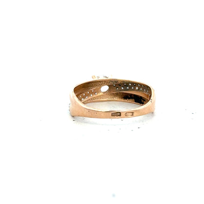 14ct gold ring in size P with a sleek band, unbranded, showcasing the elegant jewelry design and shiny gold finish.