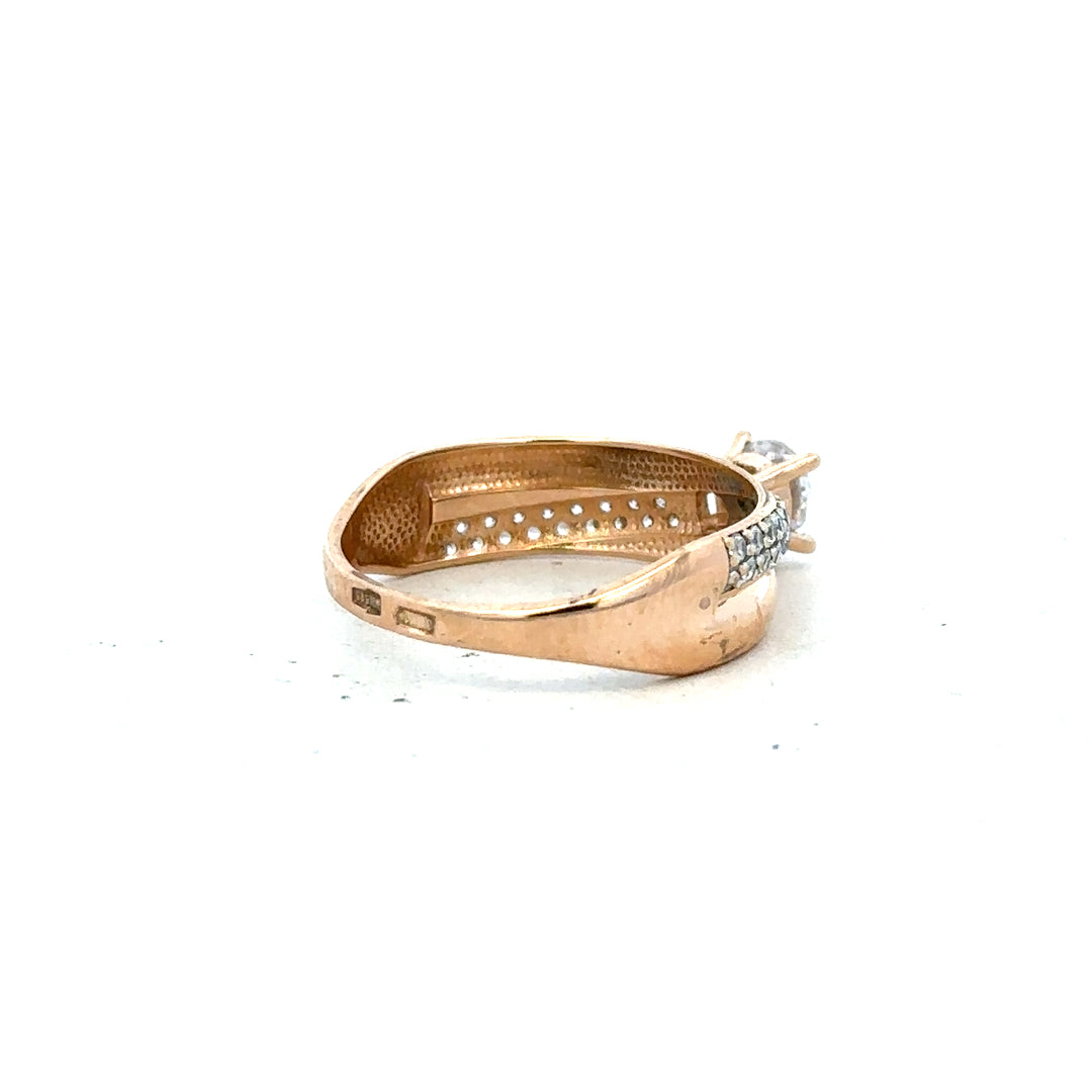 14ct gold ring in size P with a simple band design, unbranded, showcasing a close-up view of the jewelry.