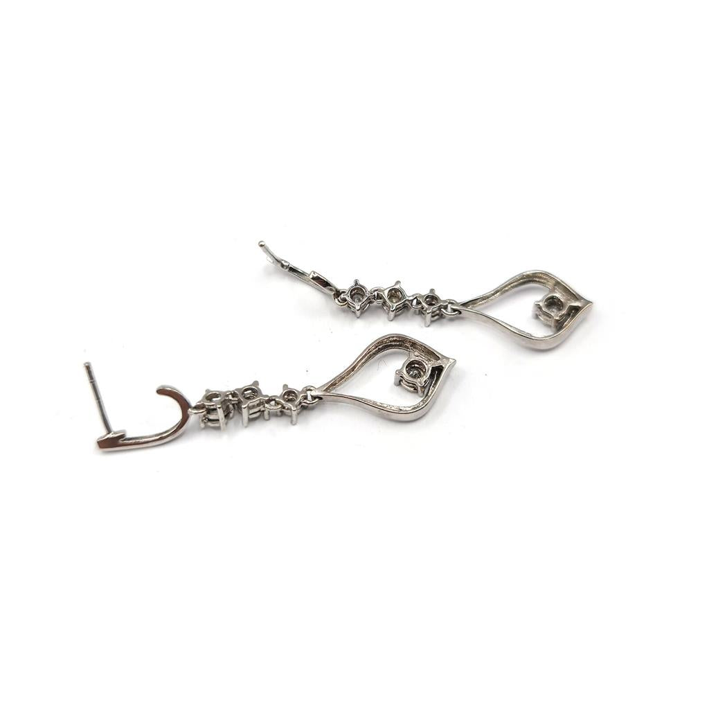 14ct white gold diamond drop earrings with 0.21 carats of sparkling diamonds, elegant jewelry accessory.