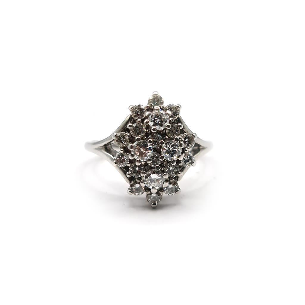 14ct white gold diamond cluster ring with 1.12 carats of sparkling diamonds, elegant unbranded jewelry piece.