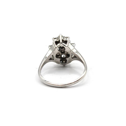 14ct white gold diamond cluster ring with 1.12 carats of sparkling diamonds, showcasing an elegant and intricate design.