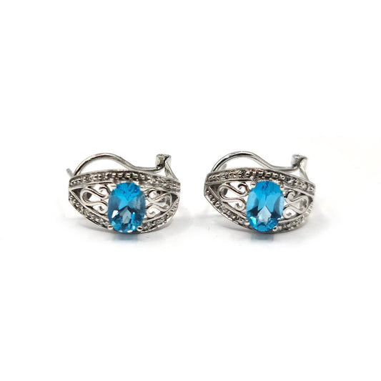 14ct white gold topaz and diamond earrings with post and lever back, featuring 1.70 carat topaz and sparkling diamonds.