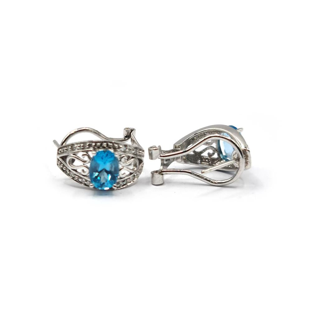 14ct white gold topaz and diamond earrings with post and lever back, featuring 1.70 carats of sparkling gemstones.