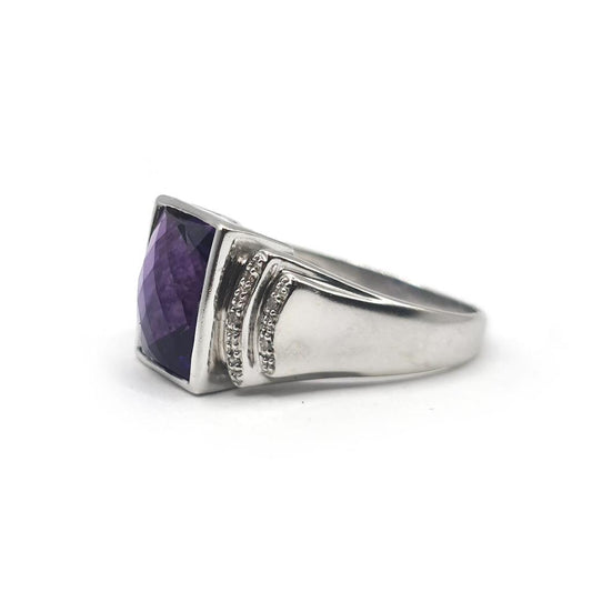 14ct white gold ring featuring a 4.25 carat amethyst centerpiece and diamond accents, showcasing elegant gemstone jewelry.
