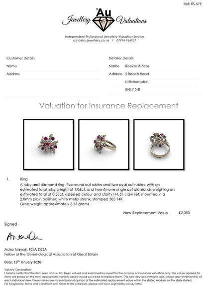 14ct white gold ruby and diamond ring featuring a central ruby and sparkling diamonds, elegant and luxurious jewelry piece.