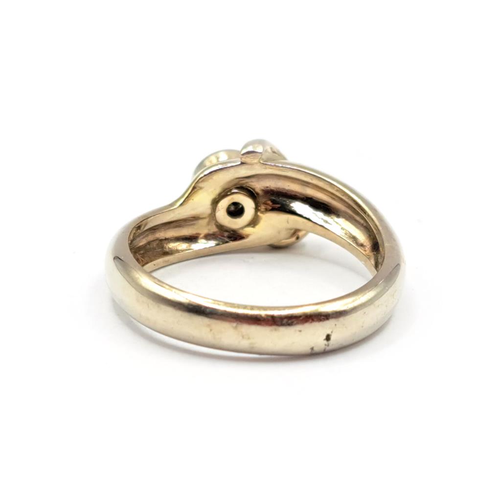 14ct yellow gold ring featuring a 1.15 carat chrysoprase gemstone and 0.20 carat diamond accents.