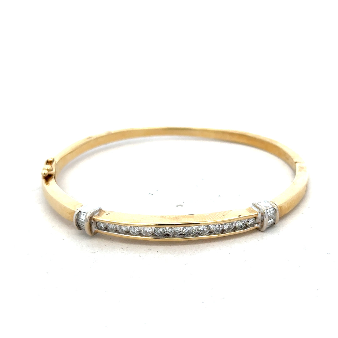 14ct yellow gold diamond bangle bracelet with 1 carat of sparkling diamonds and a weight of 17.5g, unbranded jewelry accessory.