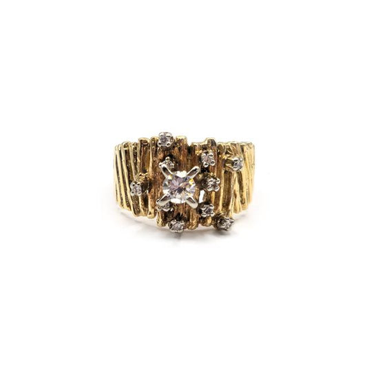 14k yellow gold diamond ring with sparkling diamonds, unbranded, showcasing elegant jewelry design and craftsmanship.