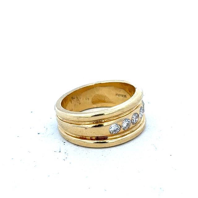 14ct yellow gold diamond ring in size J1/2, showcasing a sparkling diamond set in a sleek gold band.