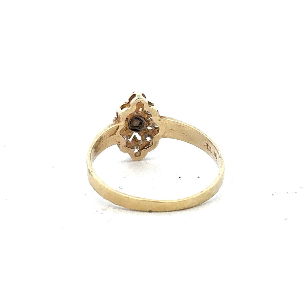 14ct yellow gold diamond ring in size L with sparkling diamonds, unbranded jewelry piece on a neutral background.
