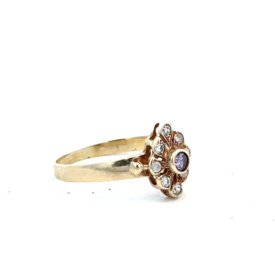14ct yellow gold diamond ring in size L with sparkling diamonds, unbranded jewelry piece on a neutral background.