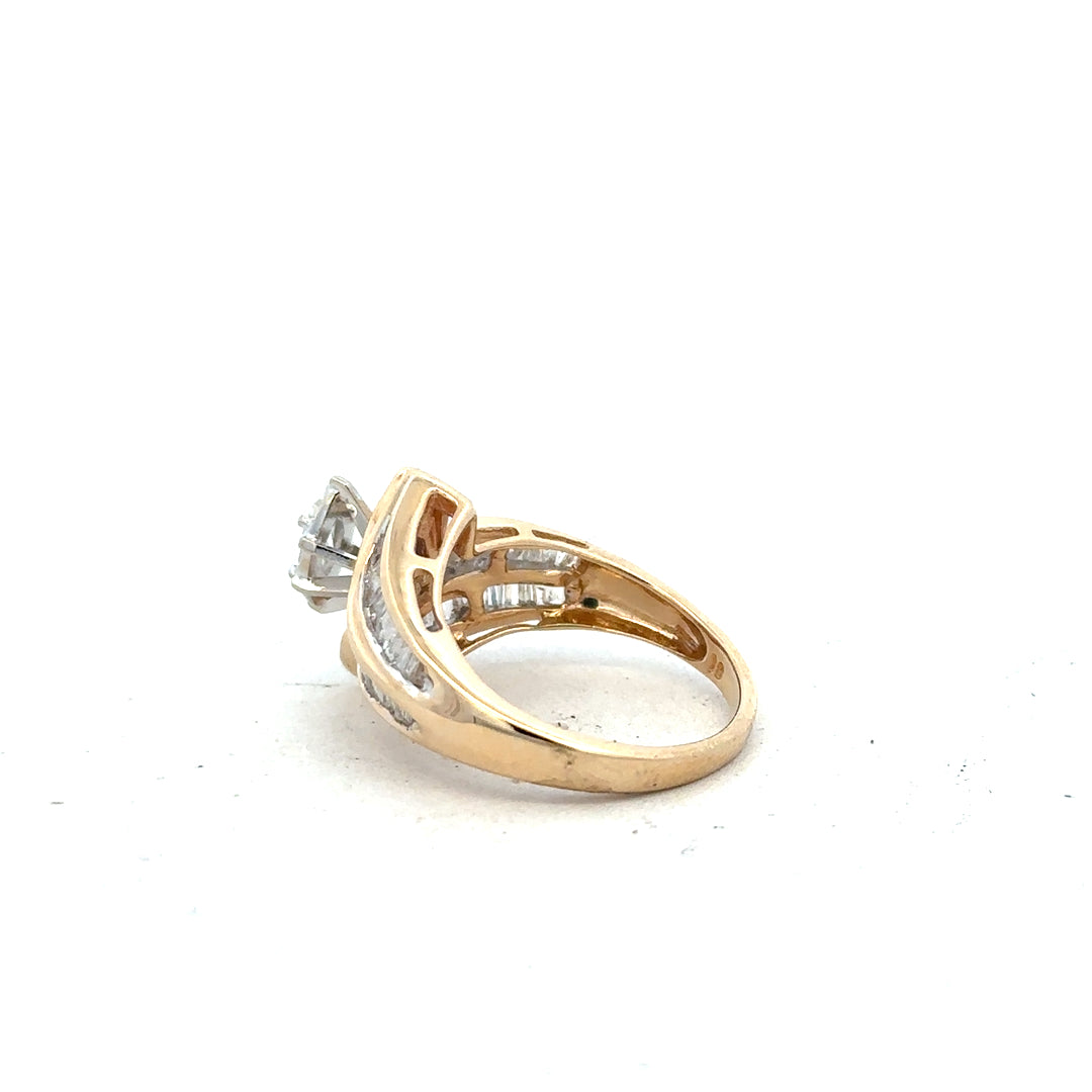 14ct yellow gold diamond ring in size L1/2 with sparkling diamonds, showcased on a plain background.