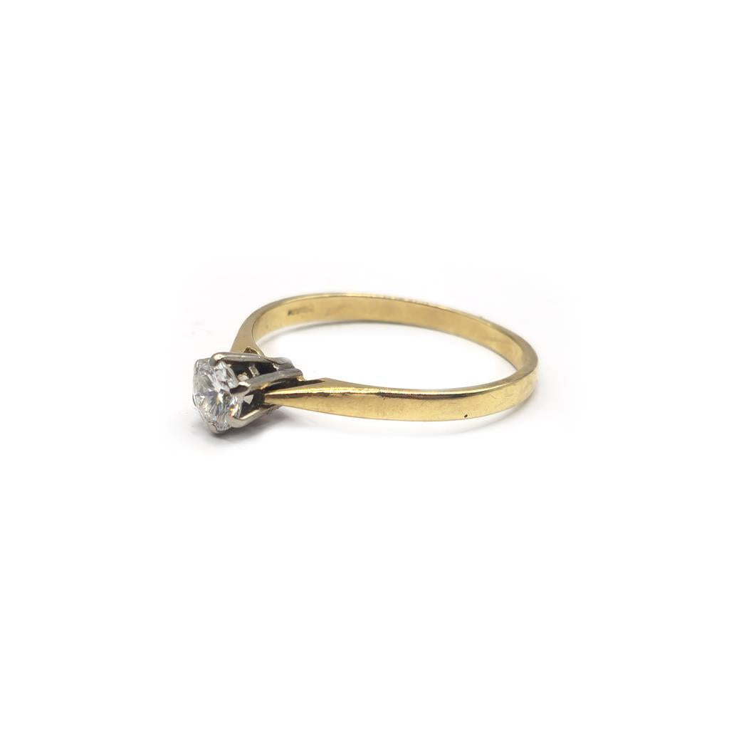 14ct yellow gold diamond ring in size P, featuring a sparkling diamond set in a simple, elegant band.
