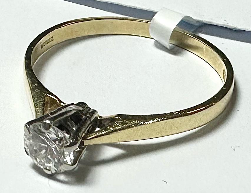 14ct yellow gold diamond ring in size P with sparkling diamonds, showcasing elegant jewelry craftsmanship.
