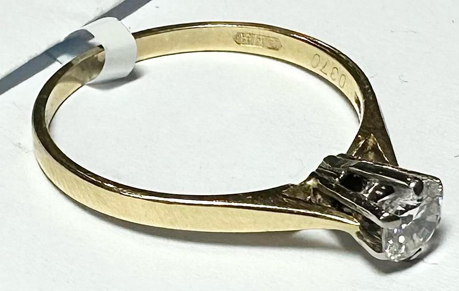 14ct yellow gold diamond ring in size P with sparkling diamonds, elegant jewelry piece with a classic design.