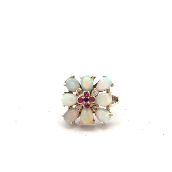 14ct yellow gold opal ring in size L 1/2 featuring a vibrant opal gemstone set in a simple gold band.