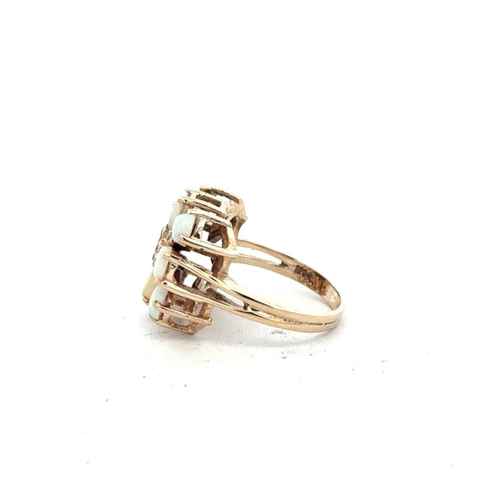 14ct yellow gold opal ring in size L 1/2 featuring a vibrant opal gemstone set in a sleek gold band.