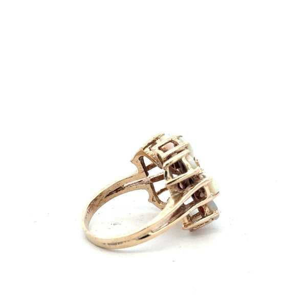 14ct yellow gold opal ring in size L1/2 featuring a vibrant opal gemstone set in a classic gold band.