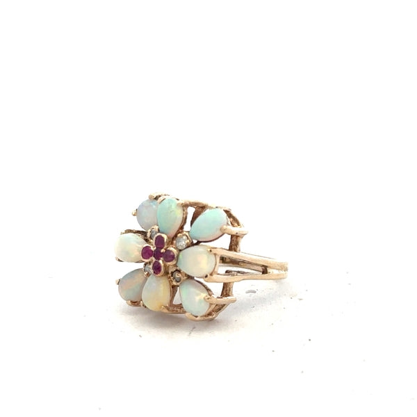 14ct yellow gold opal ring in size L1/2 with a vibrant opal gemstone, featuring a sleek gold band design.