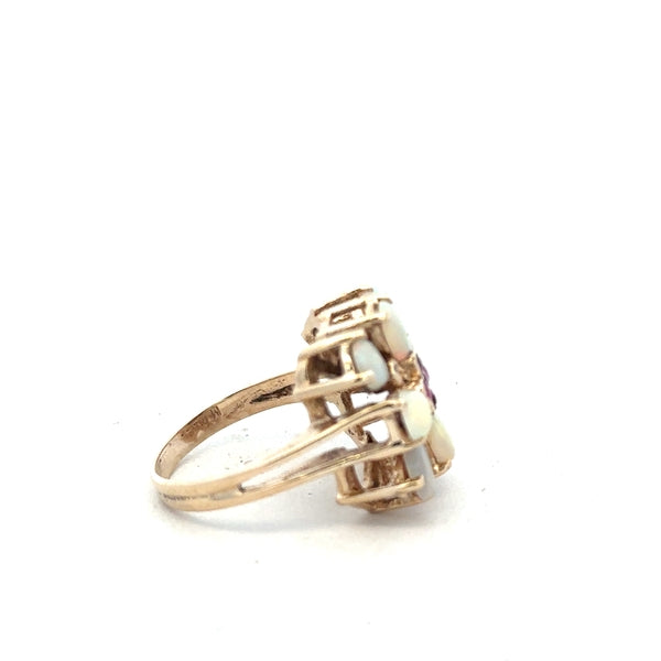 14ct yellow gold opal ring in size L1/2 with a vibrant opal gemstone, showcasing elegant craftsmanship and a smooth band.