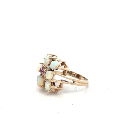 14ct yellow gold opal ring in size L1/2 featuring a vibrant opal gemstone set in a sleek gold band.