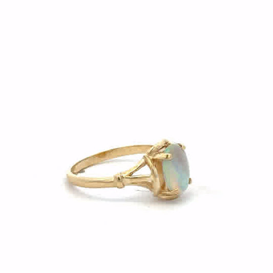 14ct yellow gold opal ring in size N with vibrant opal gemstone, unbranded jewelry showcasing elegant craftsmanship.
