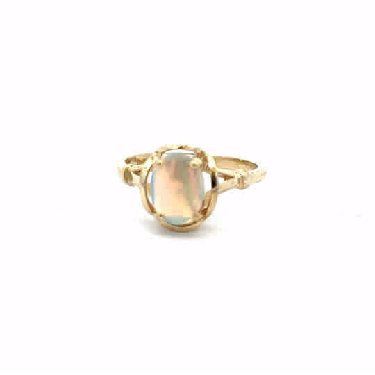 14ct yellow gold opal ring in size N featuring a vibrant opal gemstone set in a simple gold band.