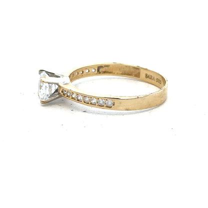 14ct yellow gold ring size O, unbranded jewelry piece with smooth band and polished finish, displayed on a neutral background.