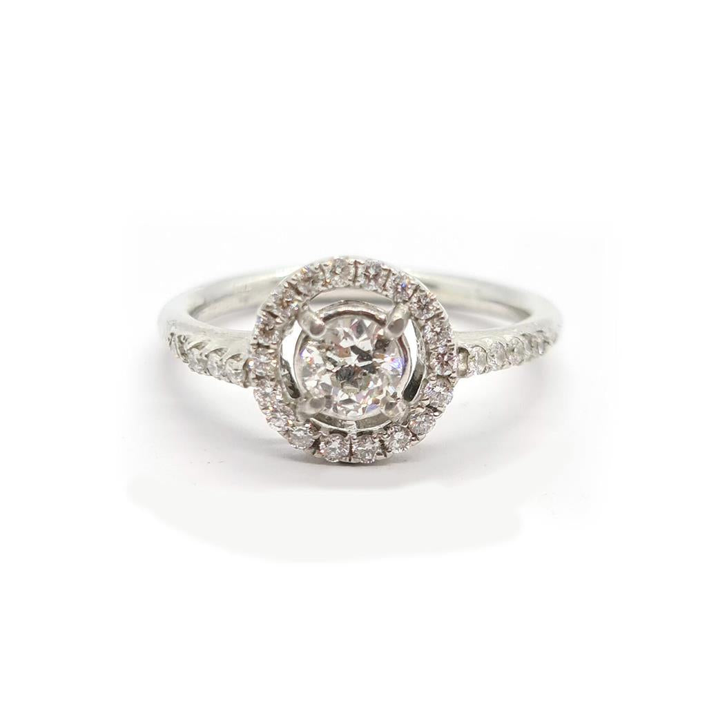 18ct gold diamond halo ring with 0.80ct center stone and surrounding smaller diamonds, elegant and sparkling jewelry piece