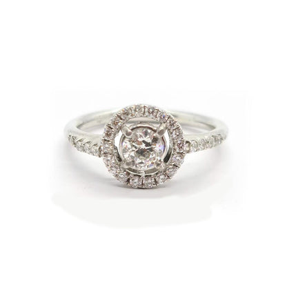 18ct gold diamond halo ring with 0.80ct center stone and surrounding smaller diamonds, elegant and sparkling jewelry piece