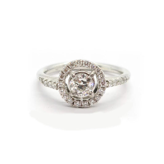 18ct gold diamond halo ring with 0.80ct center stone and surrounding smaller diamonds, elegant and sparkling jewelry piece