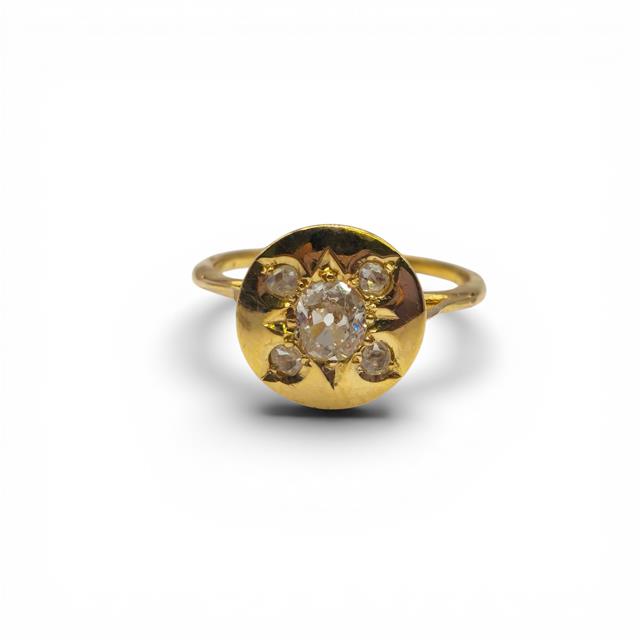Antique 18ct yellow gold diamond ring featuring intricate design and sparkling diamonds, unbranded jewelry piece.