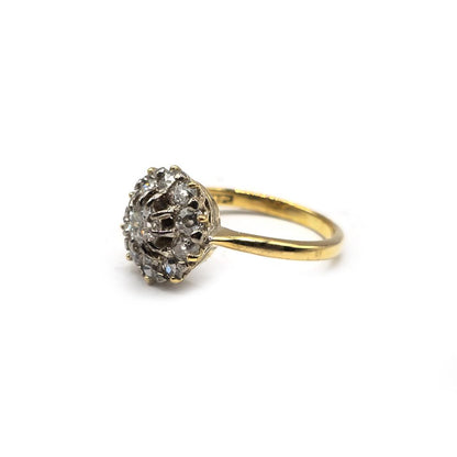 Unbranded 18ct diamond ring with a sparkling central diamond set in a sleek band, elegant jewelry piece.
