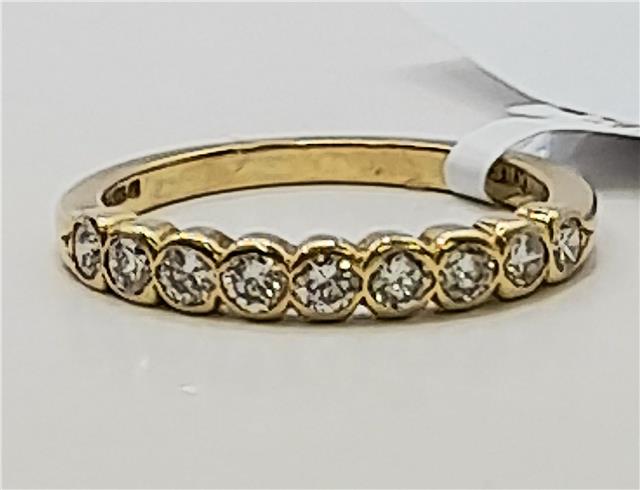 18ct diamond ring in size N featuring a sparkling diamond setting, unbranded elegant jewelry piece.