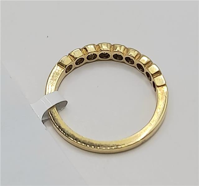 Elegant 18ct diamond ring in size N with sparkling diamonds, unbranded jewelry piece showcasing fine craftsmanship.