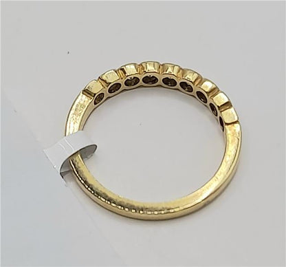 Elegant 18ct diamond ring in size N with sparkling diamonds, unbranded jewelry piece showcasing fine craftsmanship.