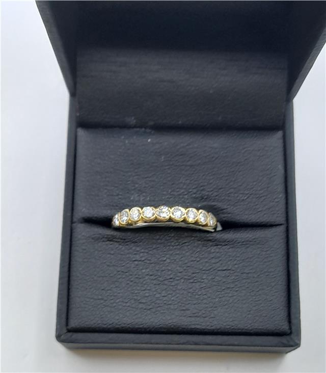 18ct diamond ring in size N featuring a sparkling central diamond and elegant band, unbranded jewelry for special occasions.