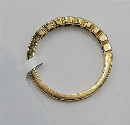 18ct diamond ring in size N featuring a sparkling diamond set in a sleek band, unbranded jewelry piece.