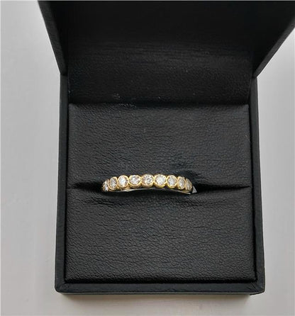 18ct diamond ring in size N featuring a sparkling diamond setting, displayed on a neutral background.