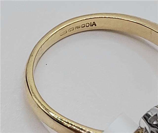 18ct gold diamond ring with 0.75ct diamonds in size L, featuring a sleek band and elegant design.