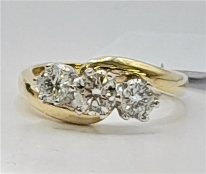 18ct gold diamond ring with 0.75ct diamonds in size L, featuring a sleek band and sparkling gemstones.